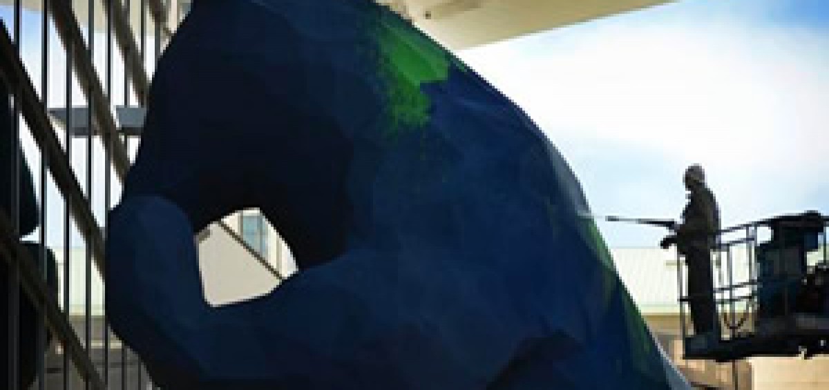 Fixing Big Blue Bear after vandalized